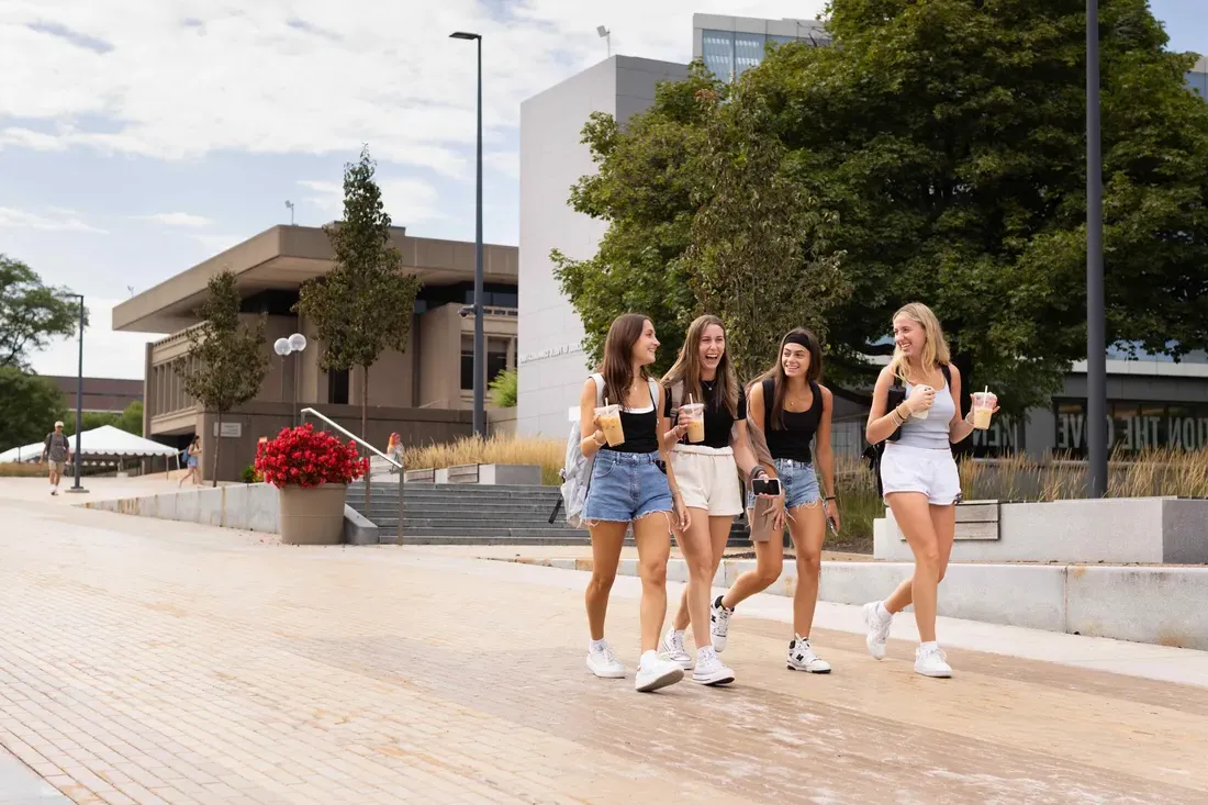 Students walking on campus.